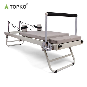 Foldable multifunctional Pilates reformer machine